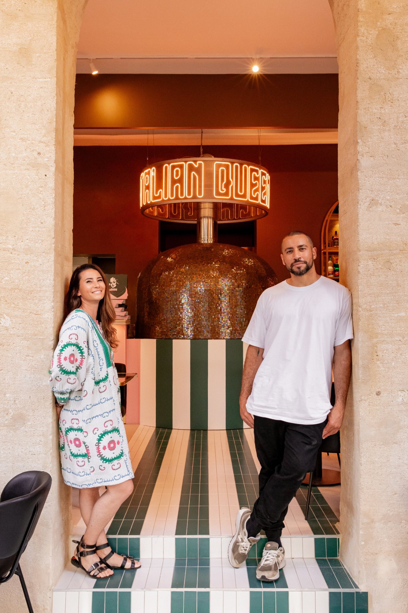 Delphine Jablonski and Jon Filin in the main aisle of Italian Queen Avignon