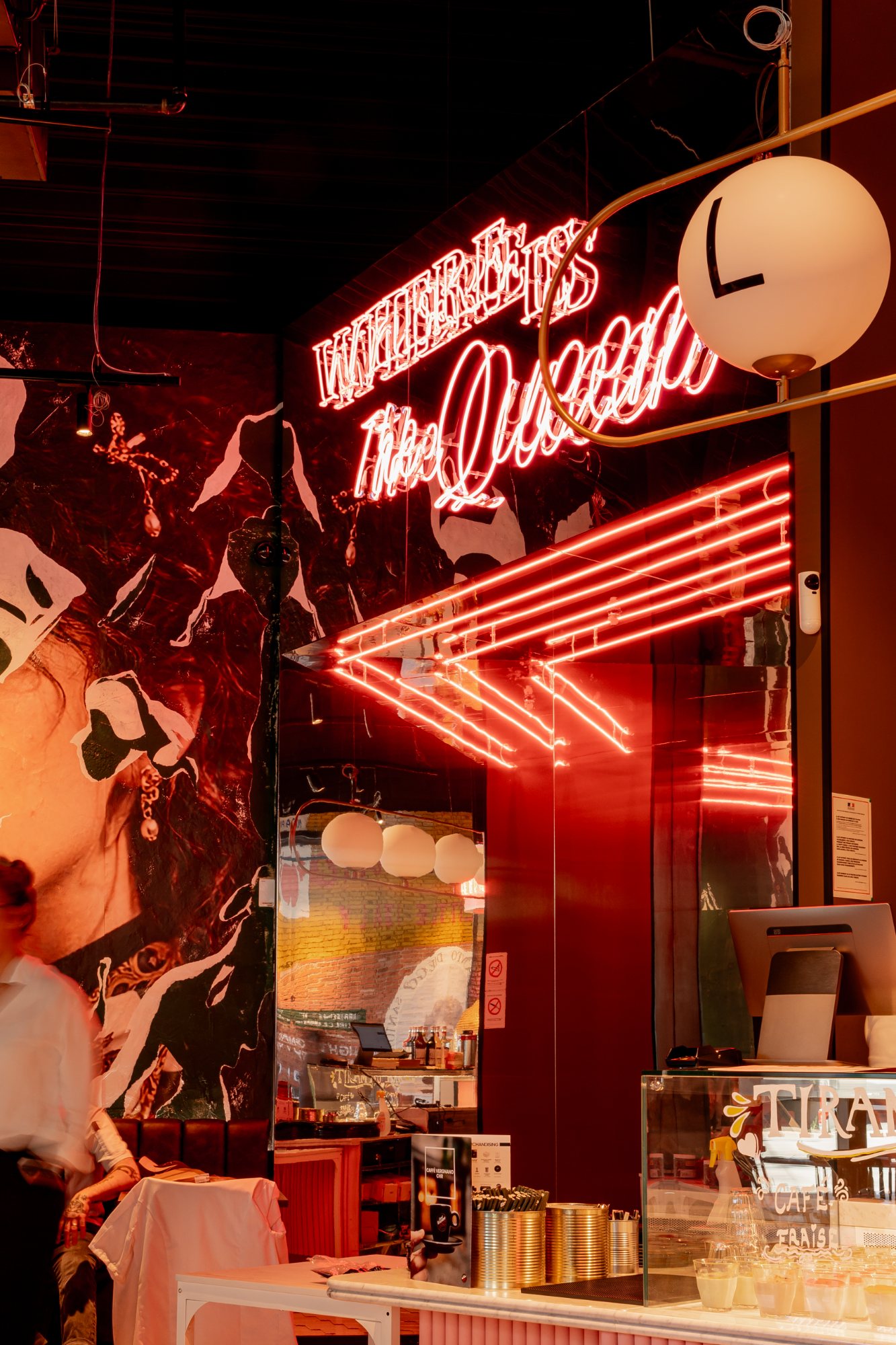 Italian Queen Marseille – Where is the Queen neon over a collage mural of Giulia, photo Jon Filin