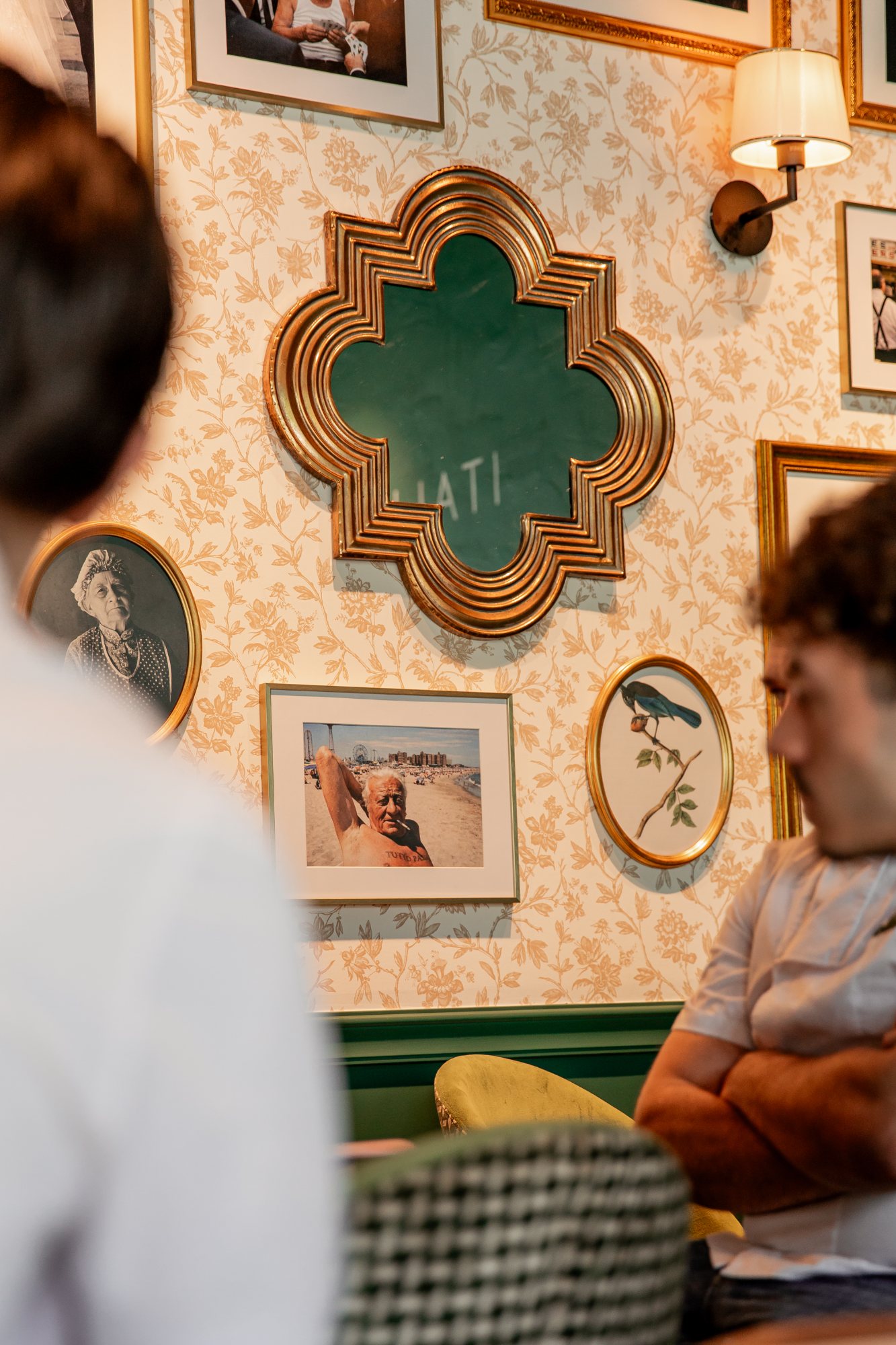 Italian Queen Meylan – family frame wall on floral wallpaper, photo Jon Filin