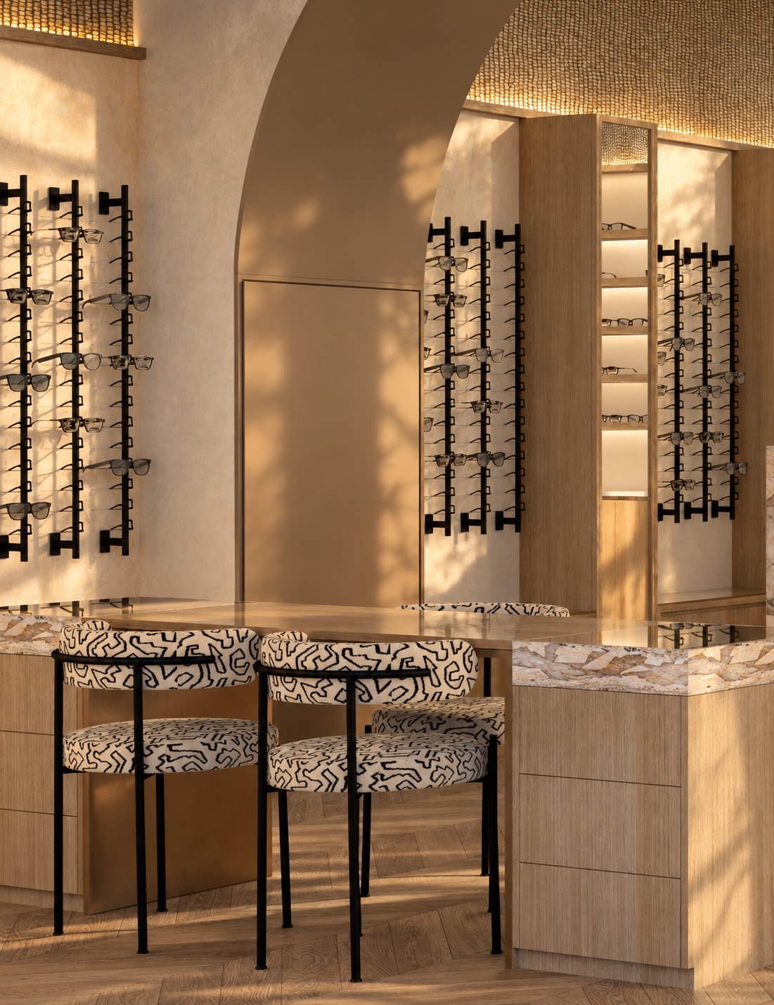 Optique Carnot – frame displays, arch and patterned chairs in golden light, interior architecture by Elise Nezzar and Patricia Da Cunha Fernandes